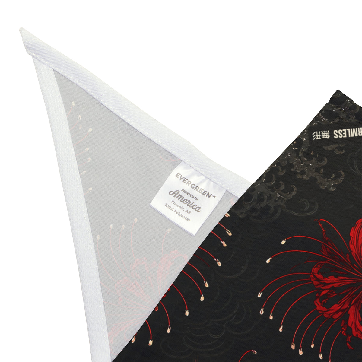 HIGANBANA dog bandana in black with all-over red spider lily print, second corner detail with hem and sewn-in label | Formless