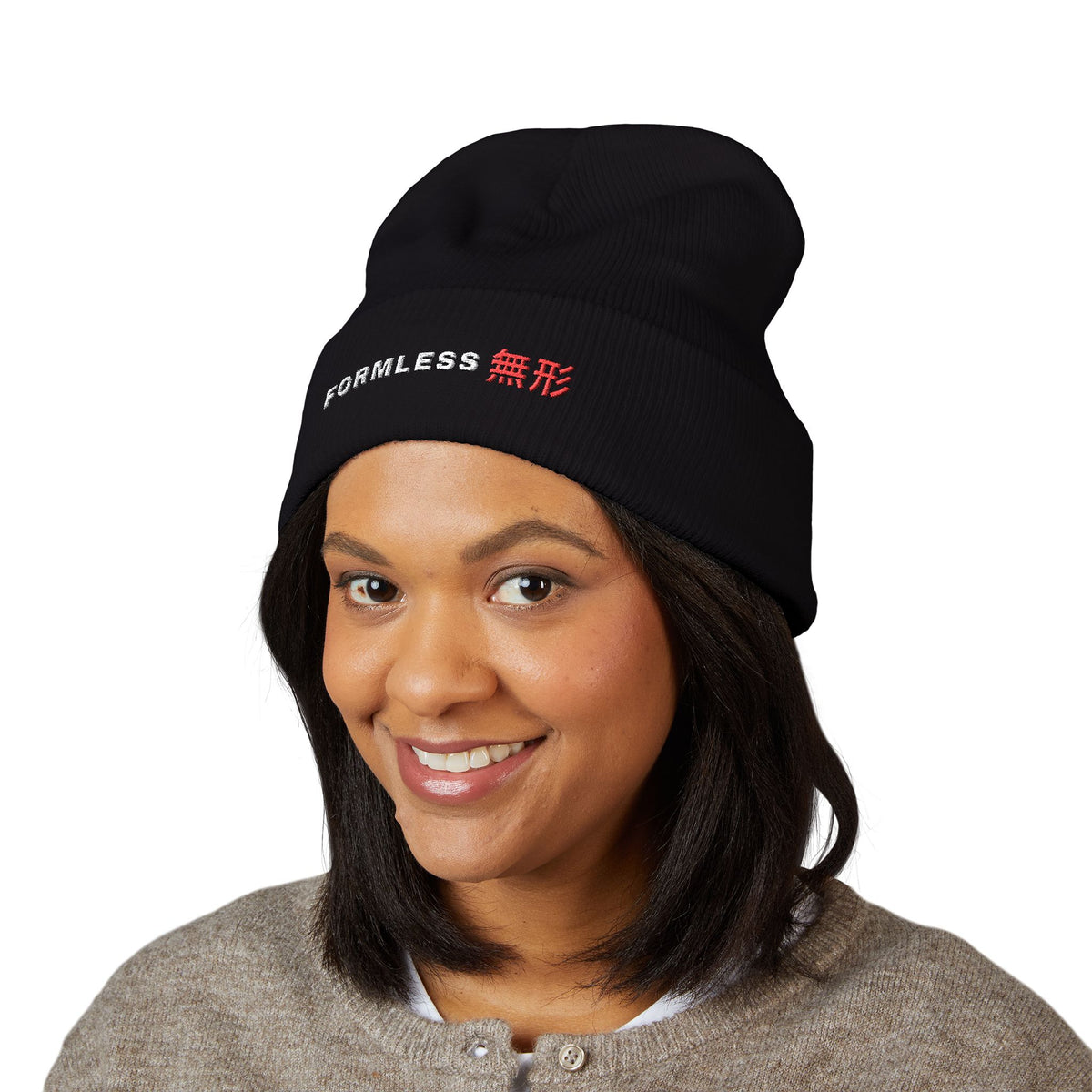 FORMLESS embroidered cuffed beanie in Black with FORMLESS 無形 wordmark on the cuff – worn, front | Formless