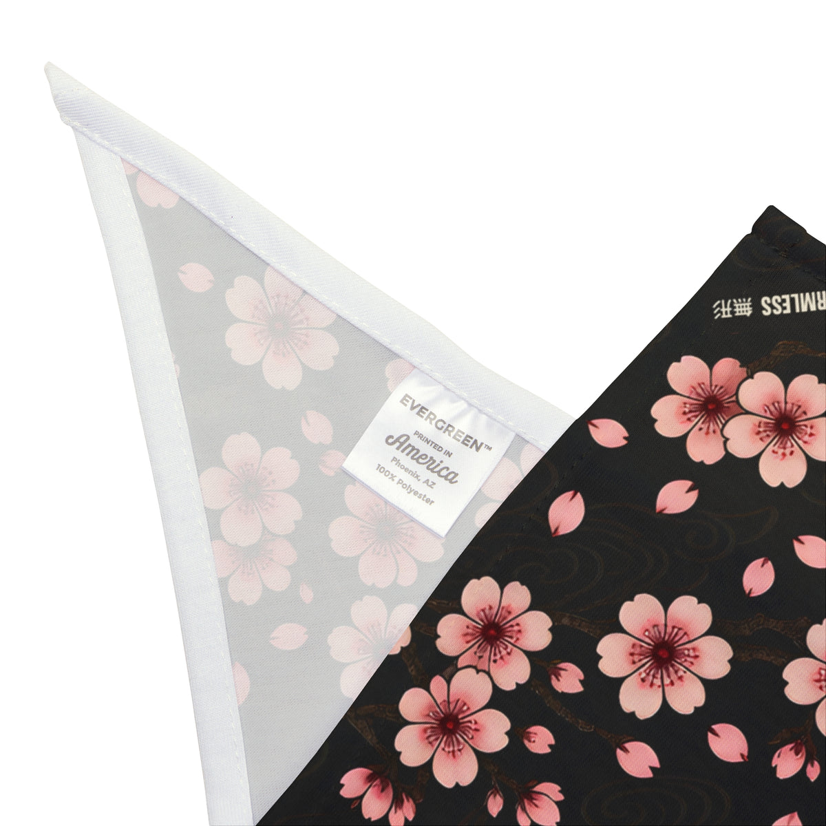 SAKURA dog bandana in black with all-over pink cherry blossom print, second corner detail with hem and sewn-in label | Formless