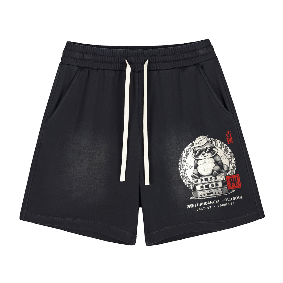 TANUKI sun fade raw edge shorts in Black, front view with large tanuki panel on the left leg | Formless