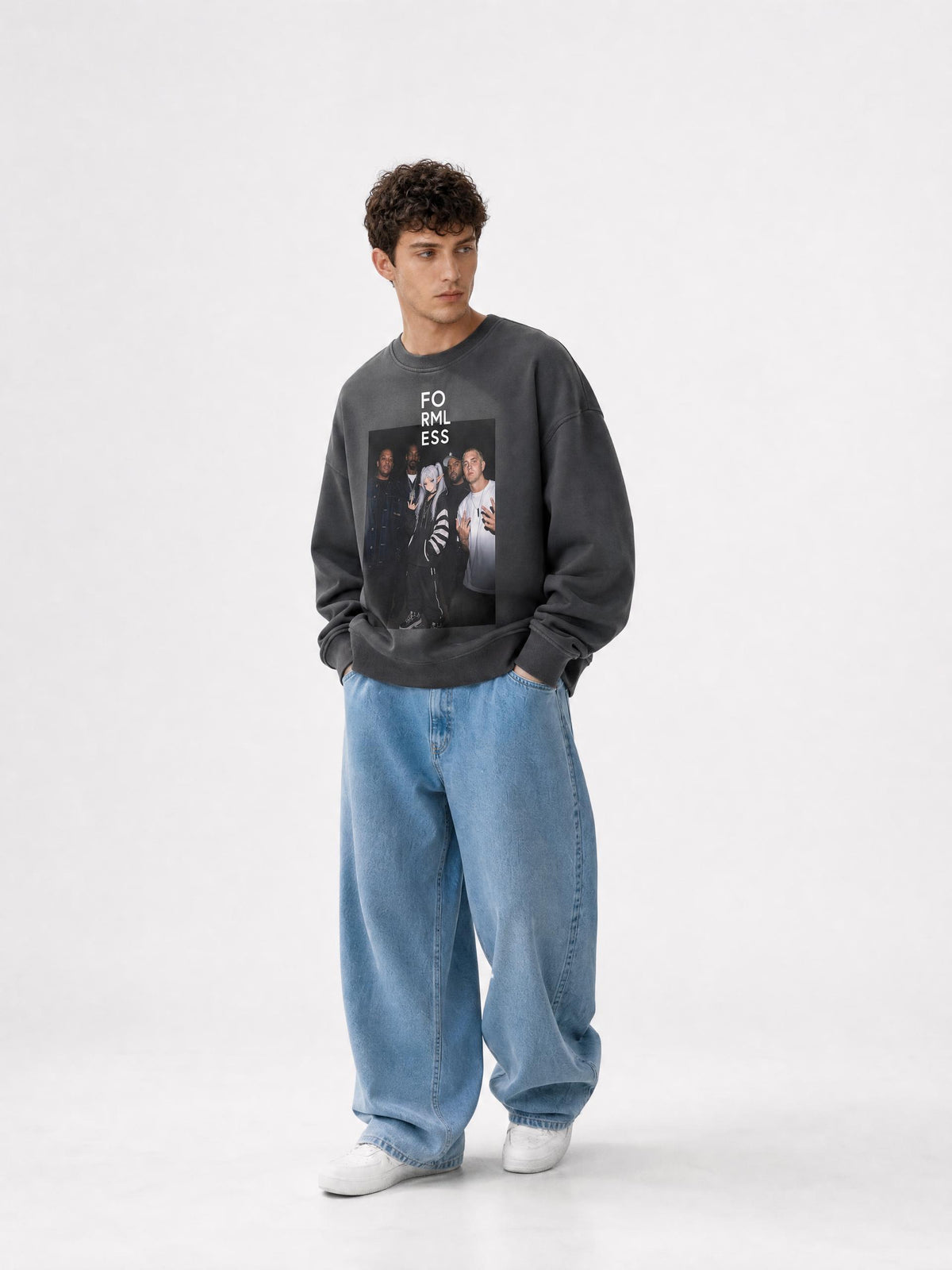 ALBUM vintage wash fleece sweatshirt in Black, worn by a model with baggy jeans, front view with photo graphic | Formless