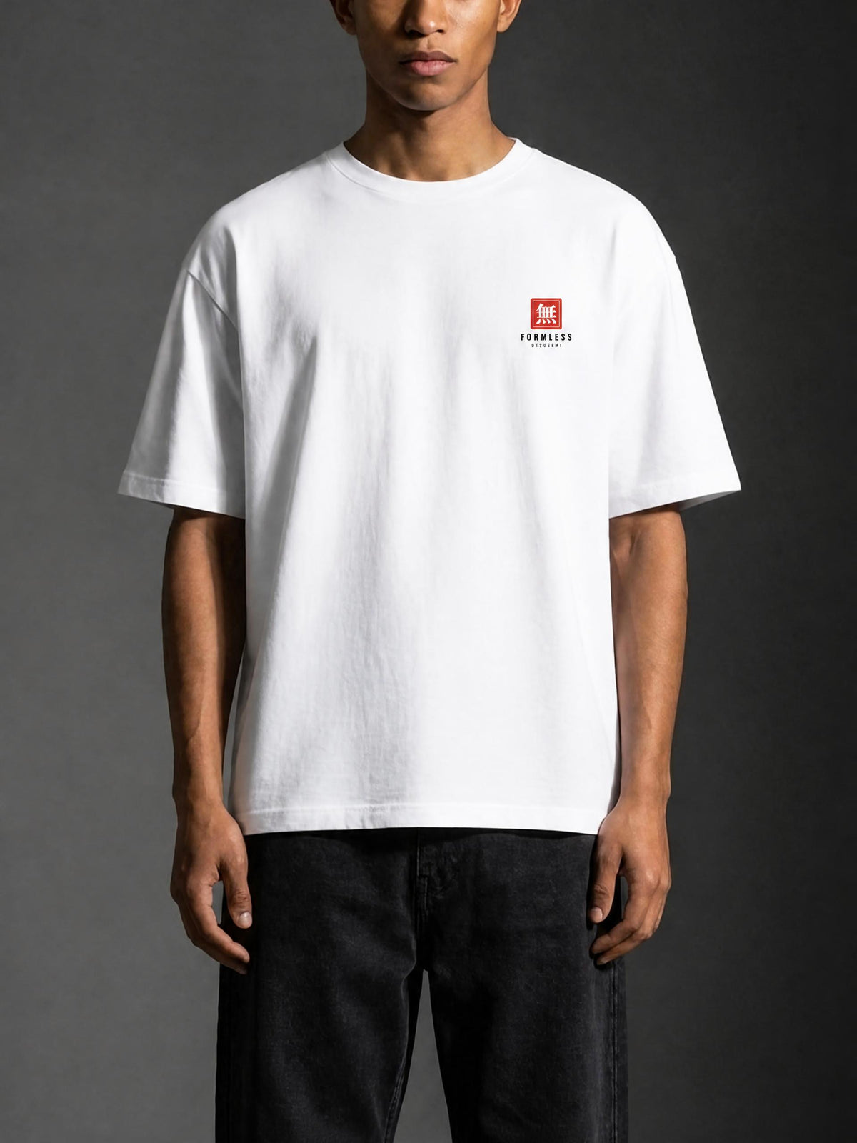 UTSUSEMI heavyweight boxy graphic tee in White, worn by a model, front view with small red chest logo | Formless
