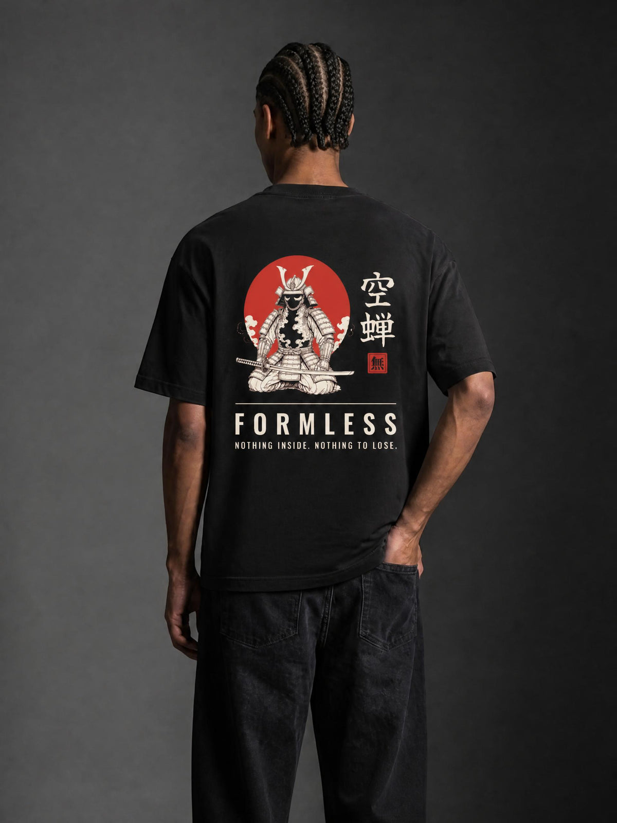 UTSUSEMI heavyweight boxy graphic tee in Black, worn by a model, back view with samurai armour and red sun print | Formless