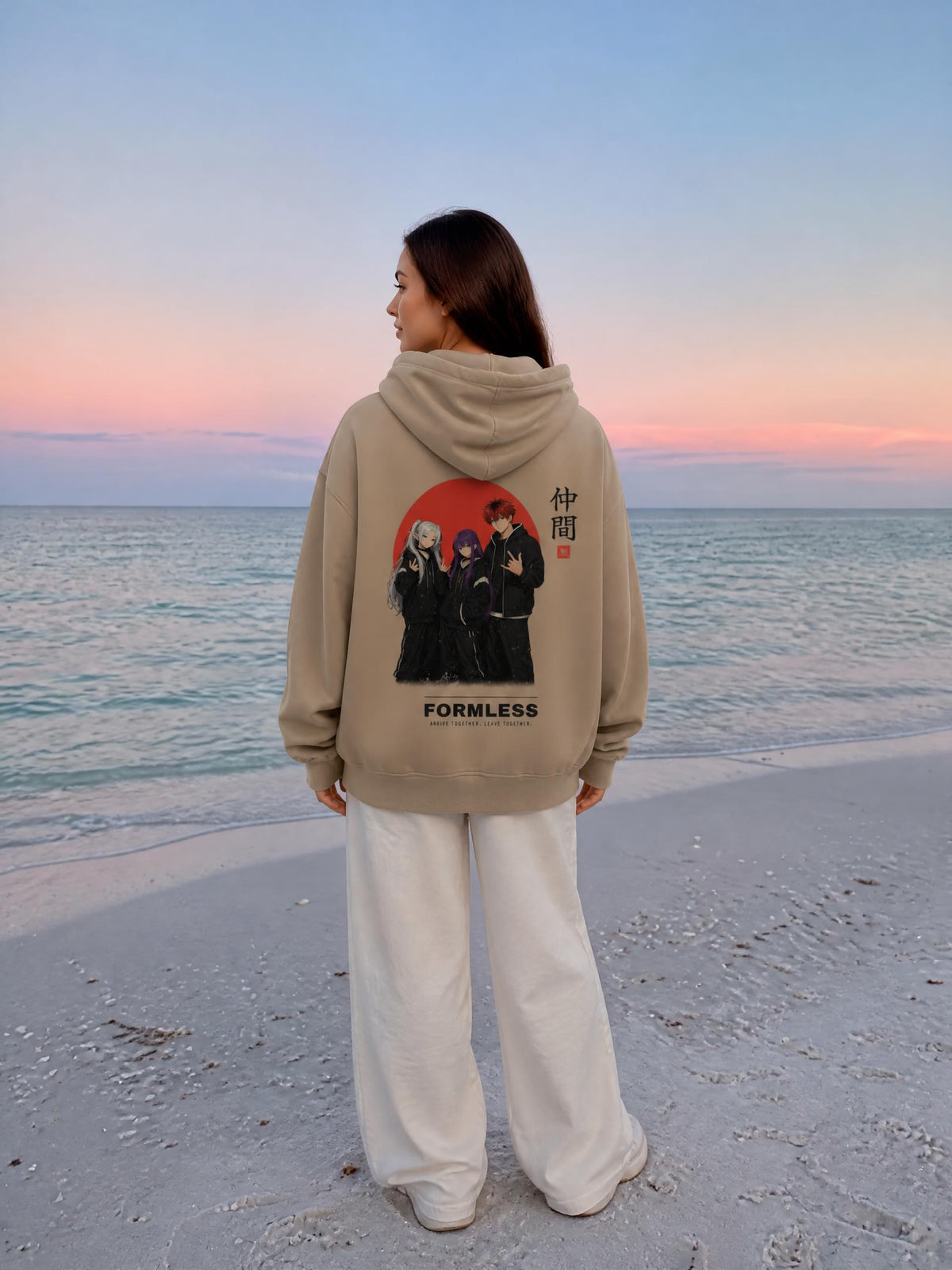 THE PARTY hand-frayed sunfade zip hoodie in Sand Apricot worn by a model on a beach at sunset, back view with illustrated trio, red rising sun and 仲間 print | Formless