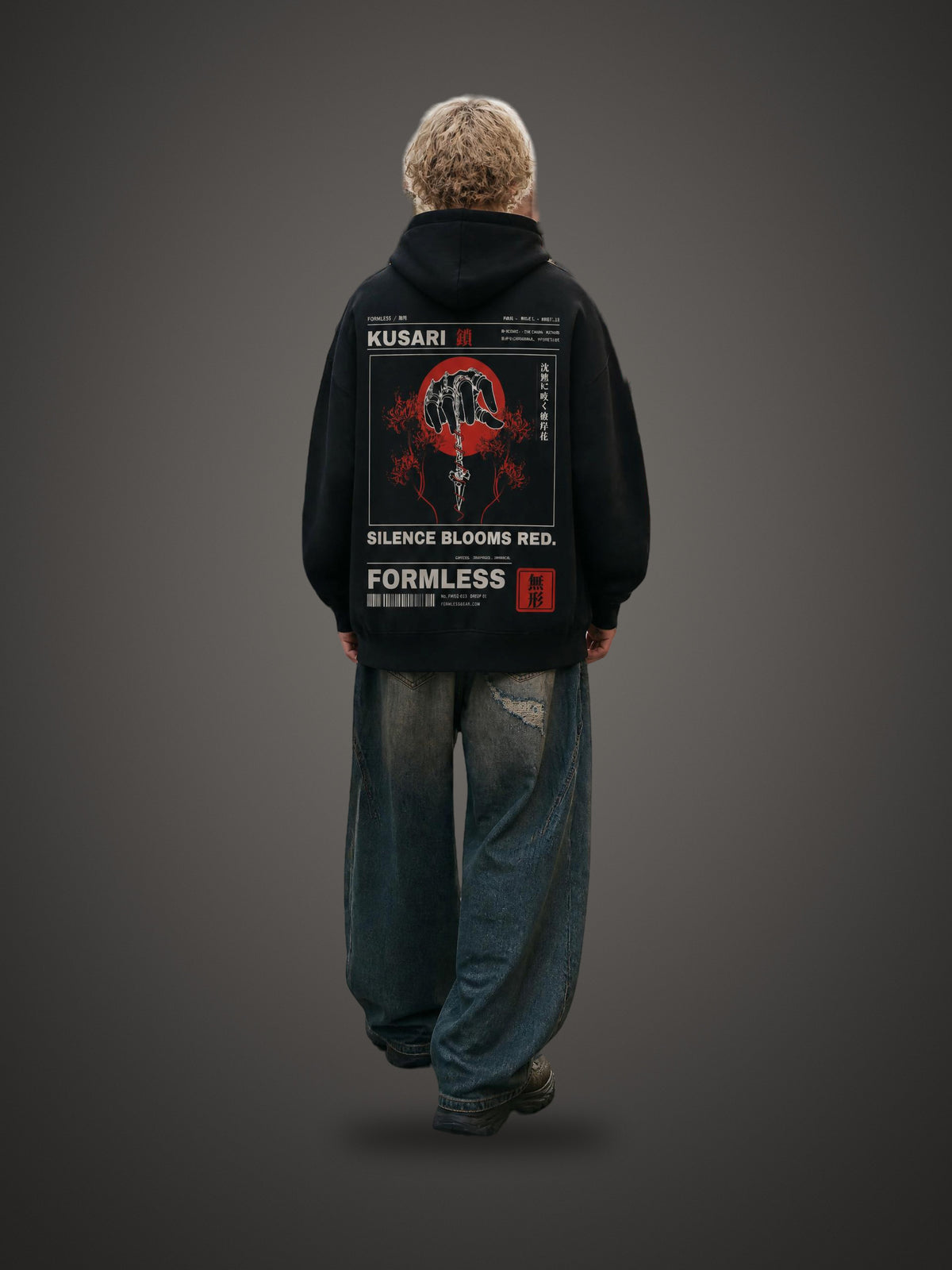 KUSARI heavyweight boxy hoodie in Black worn by a model, back view with chained hand, dagger, red sun and spider lily print | Formless