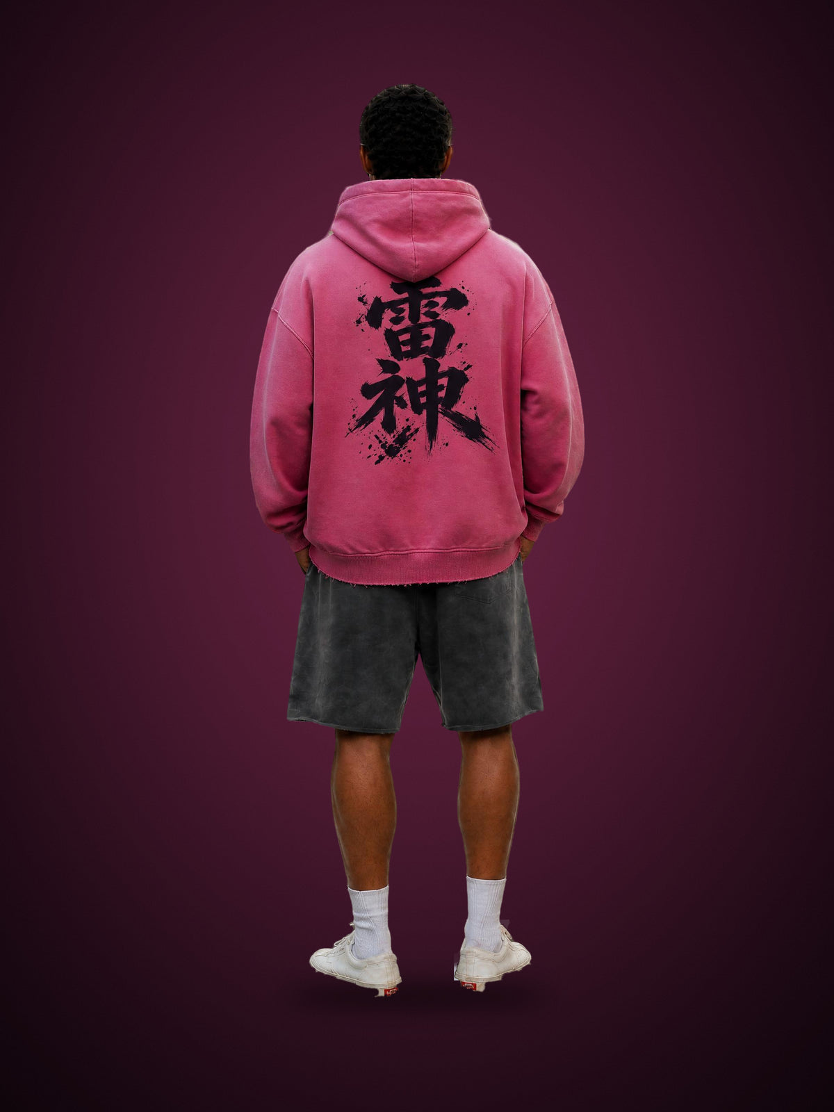 RAIJIN 雷神 fleece hoodie in Rose Pink worn by a model, back view with large 雷神 kanji print | Formless