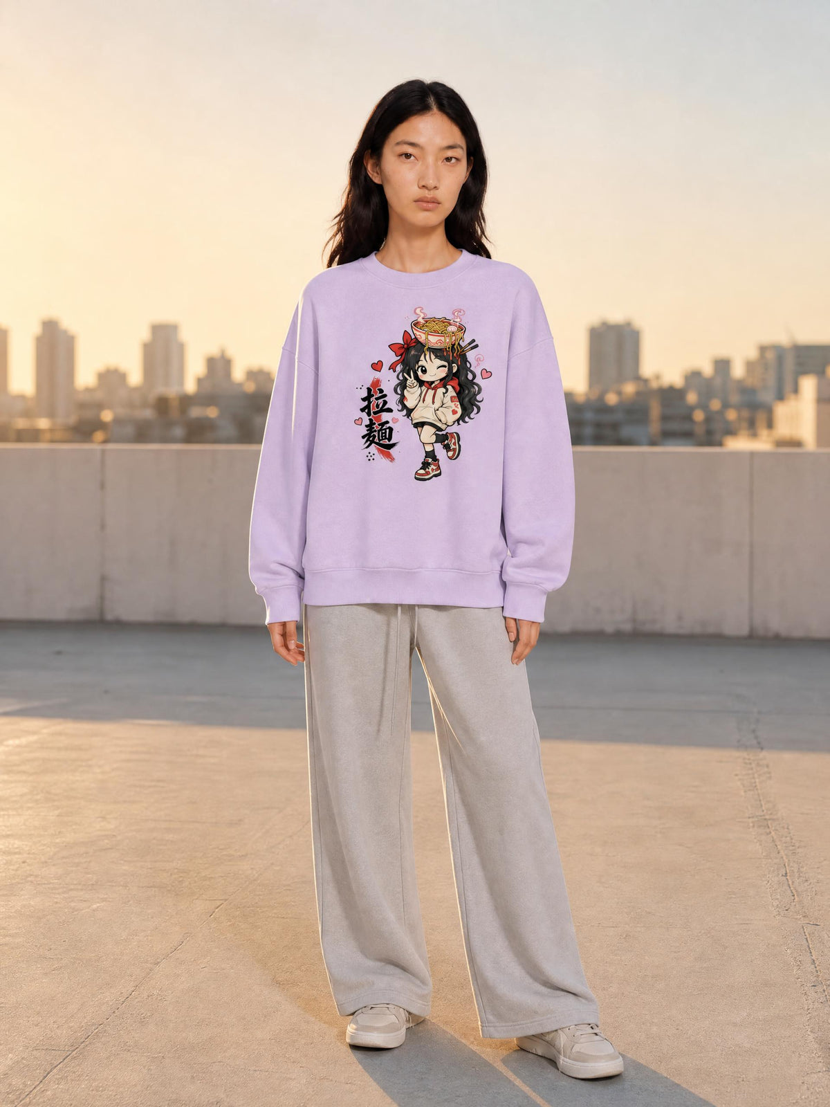 RAMEN GIRL 拉麺 boxy fleece sweatshirt in Light Purple worn by a model on a rooftop at golden hour, front view with ramen girl print | Formless