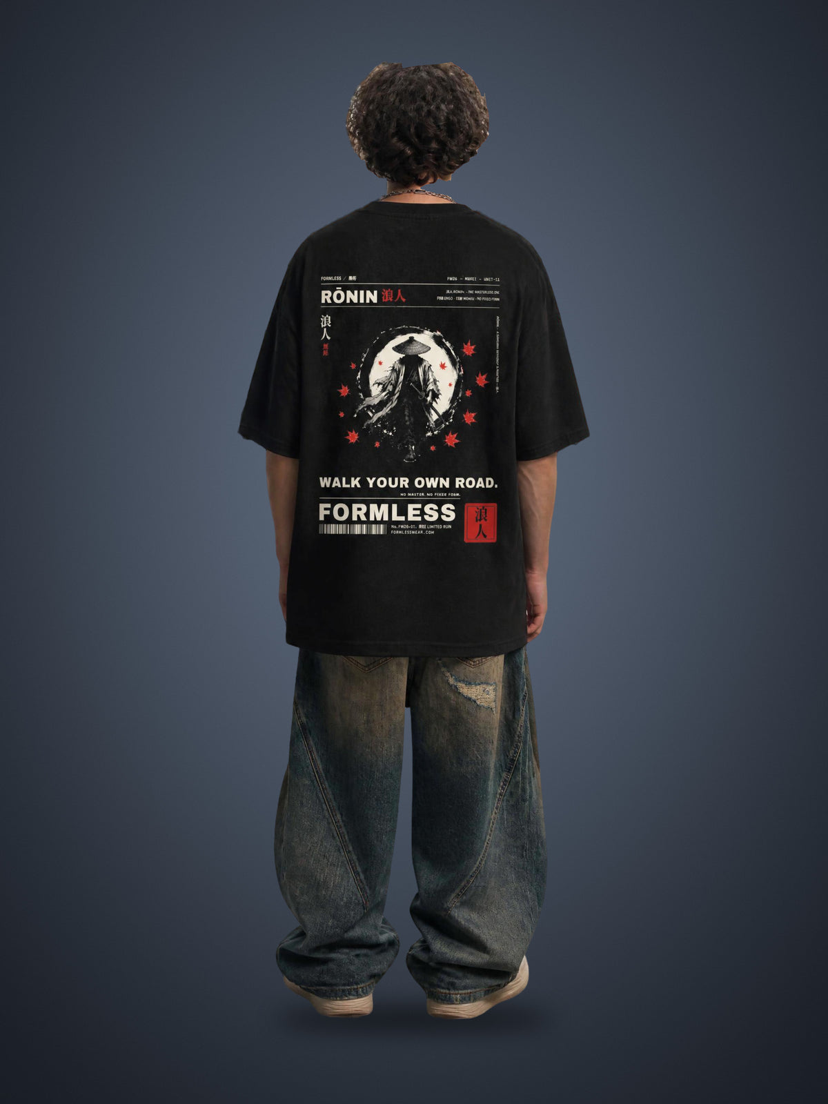 RŌNIN washed waffle knit tee in Black worn by a model, back view with wandering ronin, red sun and WALK YOUR OWN ROAD print | Formless