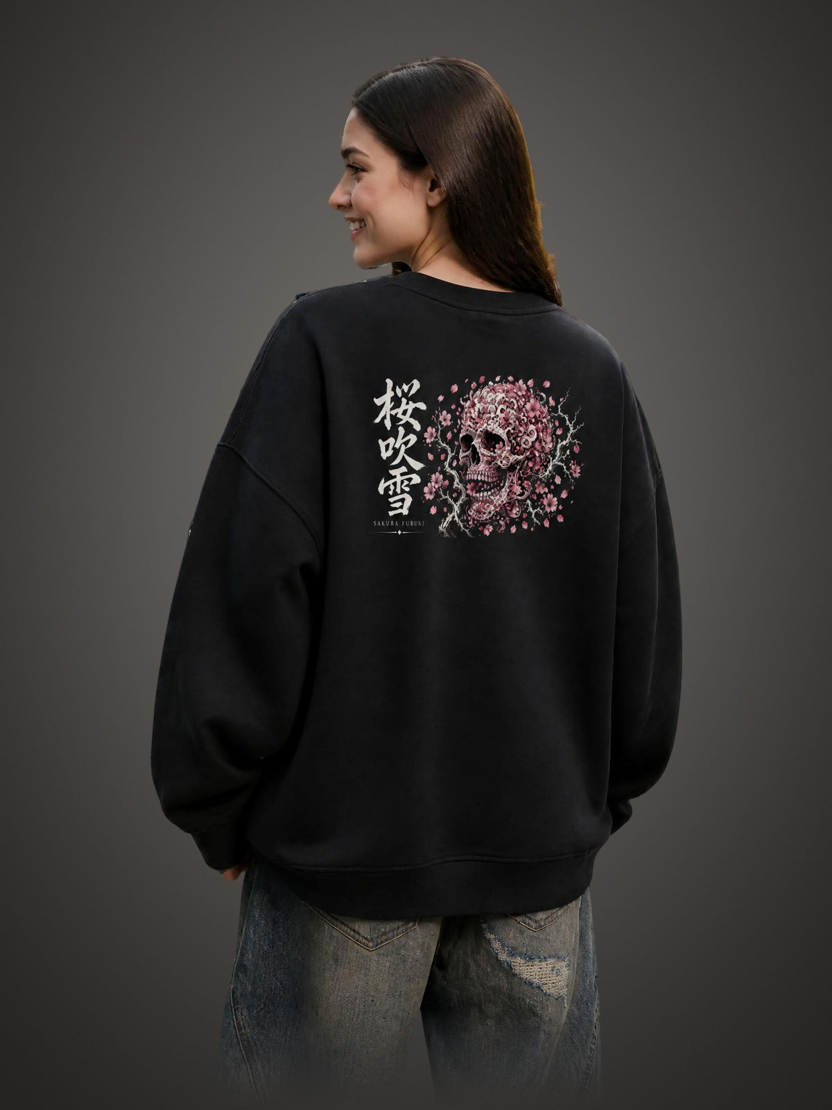 SAKURA FUBUKI 桜吹雪 distressed sweatshirt in Black worn by a model, back view with cherry blossom storm skull print | Formless